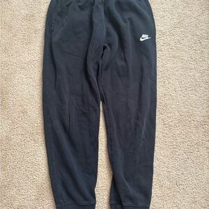 Nike Black Sweatpants with Tapered Fit and Elastic Cuffs